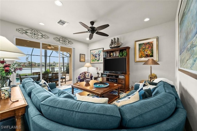 11309 Pond Cypress St, Fort Myers, FL 33913 - living area with a sunroom, a ceiling fan, and recessed lighting