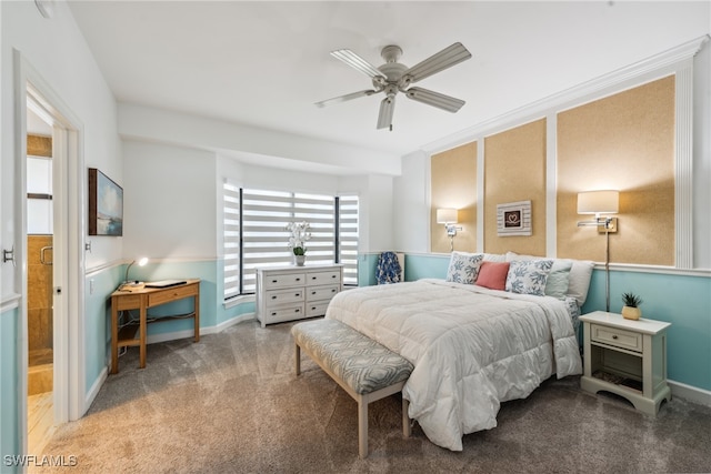 carpeted bedroom with ceiling fan and crown molding