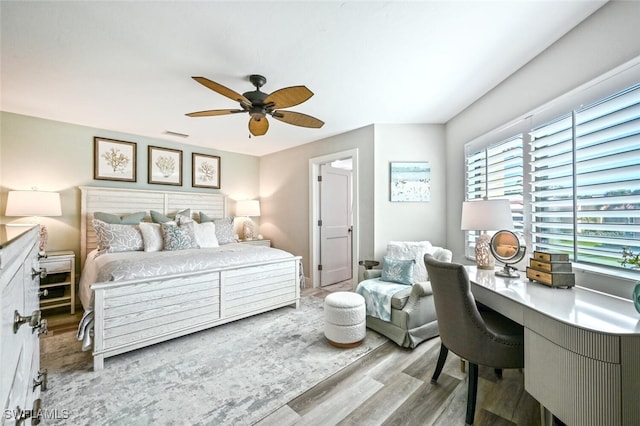 bedroom featuring ceiling fan and light wood-type flooring