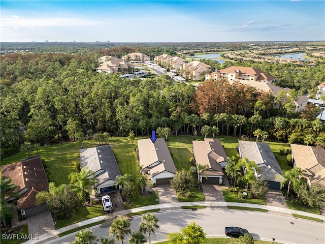 bird's eye view featuring a residential view and a water view