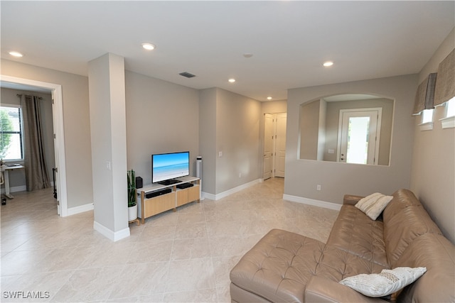 living room featuring light tile patterned floors