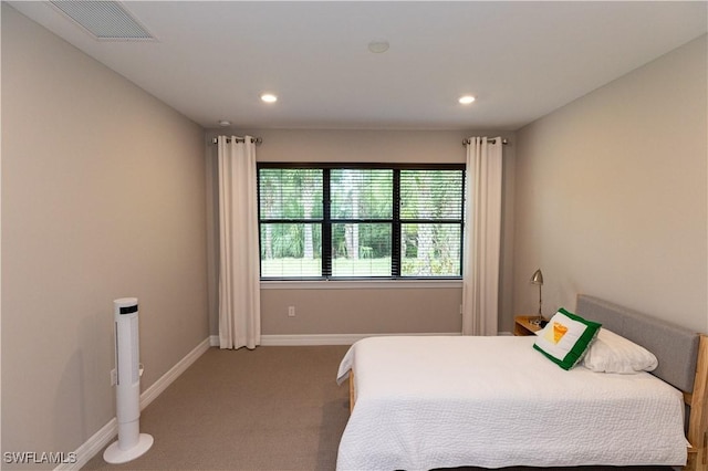 bedroom featuring carpet, visible vents, baseboards, and recessed lighting