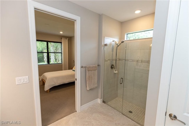 full bathroom with a shower stall, baseboards, connected bathroom, and recessed lighting