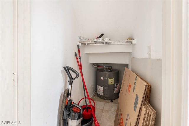 utility room featuring water heater