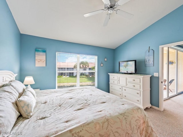 bedroom with ceiling fan, vaulted ceiling, and light carpet