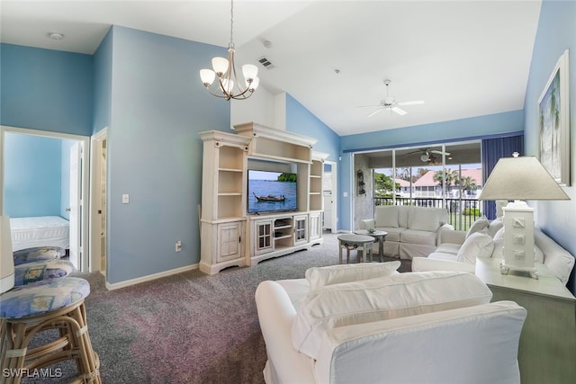 living room featuring ceiling fan with notable chandelier, vaulted ceiling, and carpet