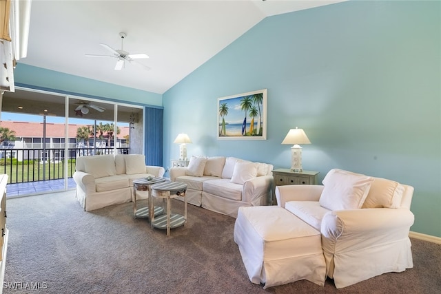 living room with vaulted ceiling, ceiling fan, and carpet flooring