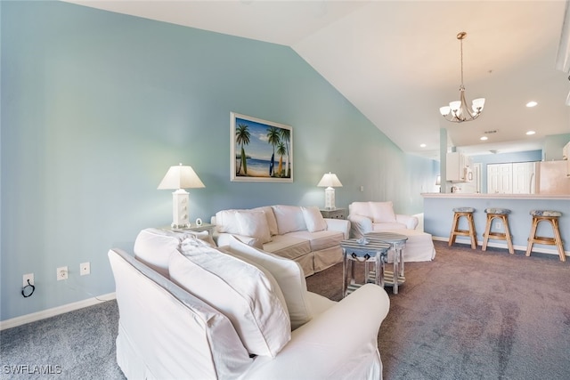 carpeted living room featuring a chandelier and vaulted ceiling