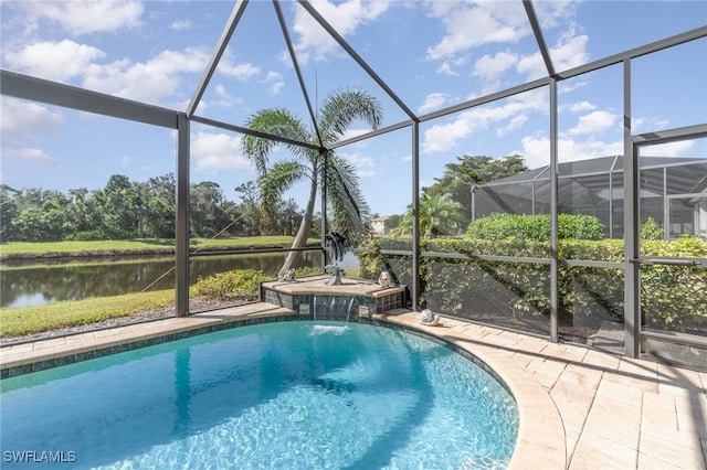 view of swimming pool featuring a jacuzzi, pool water feature, a lanai, a patio area, and a water view