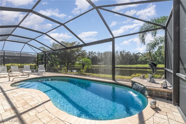 view of swimming pool with a patio, pool water feature, a water view, and glass enclosure