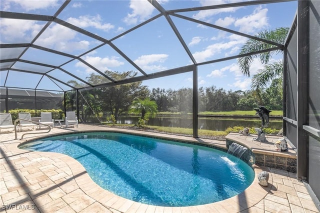 outdoor pool featuring a lanai, a water view, and a patio