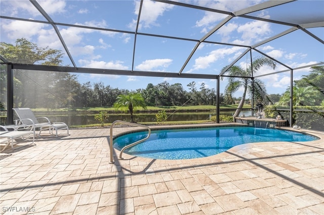 view of swimming pool featuring a patio area, pool water feature, a water view, and a lanai