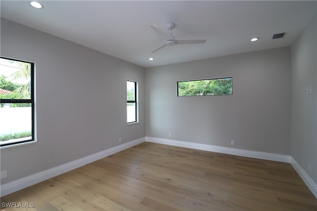 unfurnished room featuring ceiling fan and light hardwood / wood-style floors