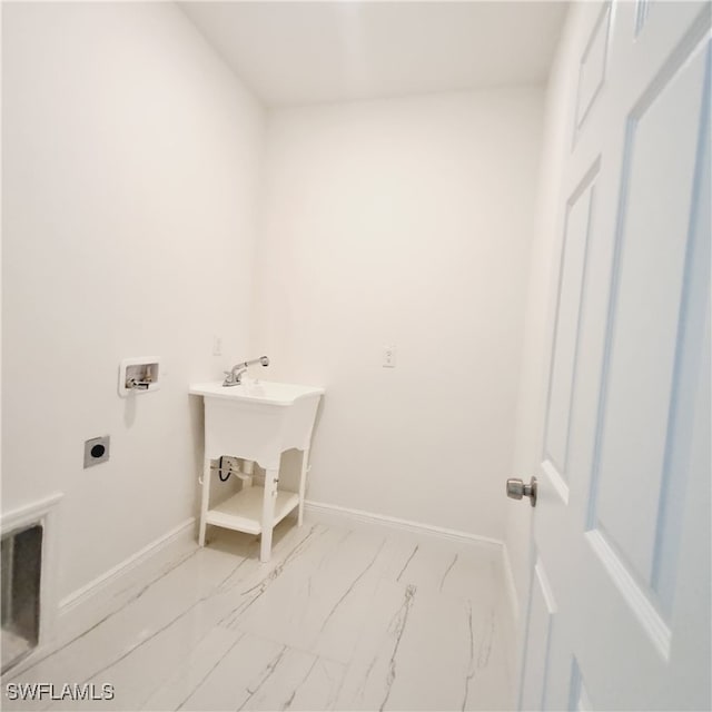 clothes washing area featuring washer hookup and electric dryer hookup