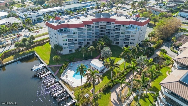 birds eye view of property with a water view