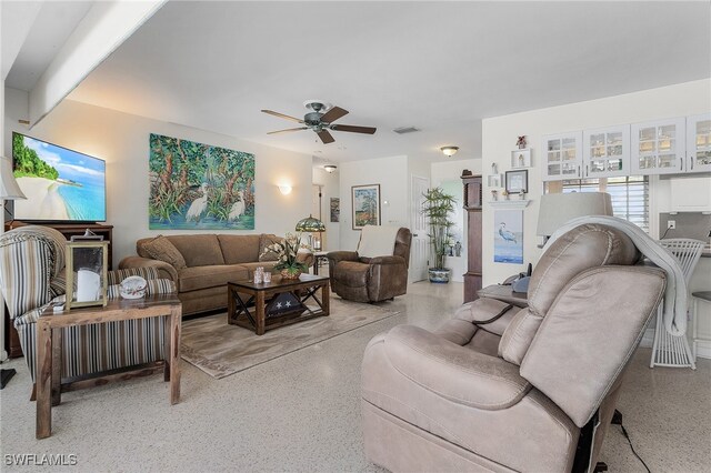 living room with ceiling fan