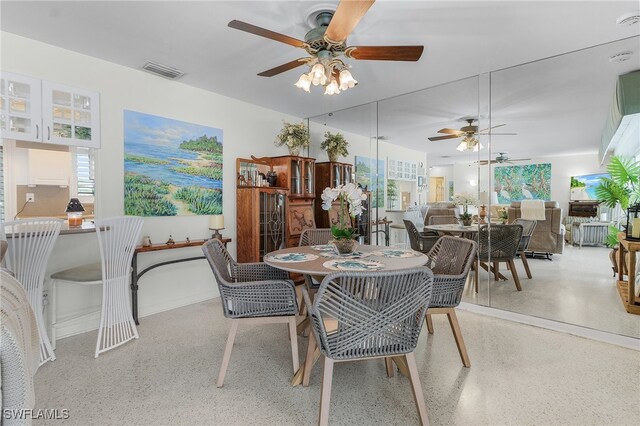 dining room with ceiling fan