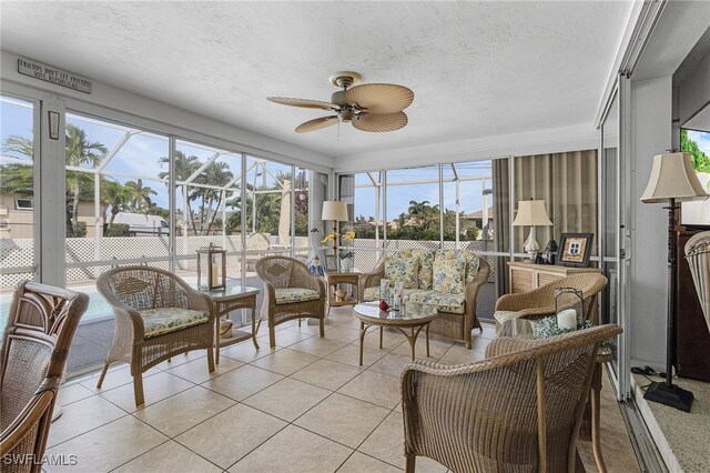 sunroom / solarium with ceiling fan