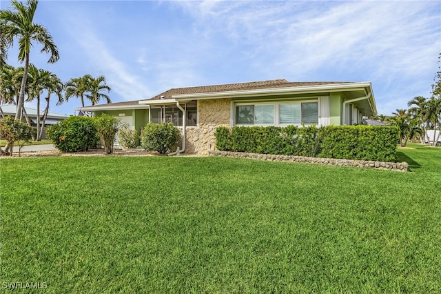 ranch-style house with a front yard