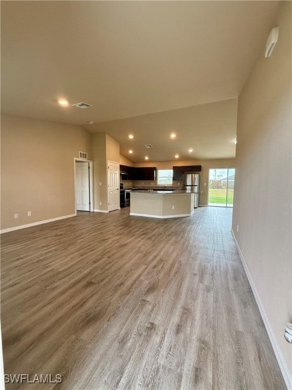 unfurnished living room with light hardwood / wood-style flooring