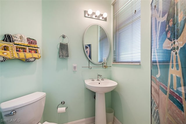 bathroom with sink and toilet