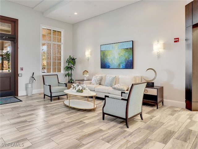 living room with light hardwood / wood-style flooring