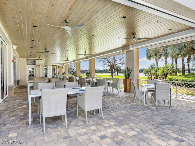 view of patio featuring ceiling fan