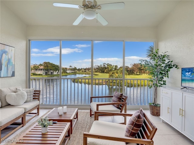 sunroom featuring ceiling fan