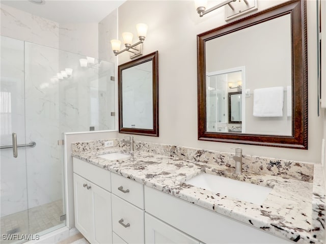 bathroom featuring vanity and walk in shower