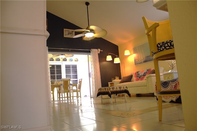 interior space with vaulted ceiling, ceiling fan, and plenty of natural light