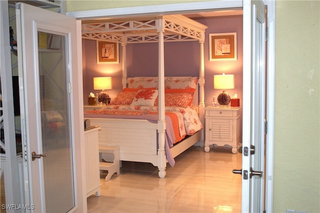 bedroom with tile patterned floors