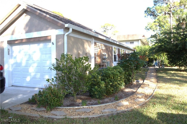 view of property exterior featuring a garage