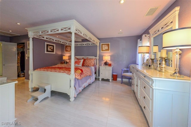 bedroom with light tile patterned floors