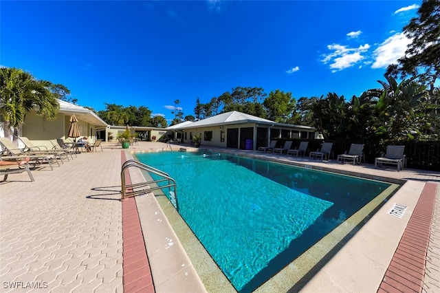 view of pool featuring a patio area