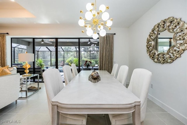 tiled dining room featuring ceiling fan with notable chandelier