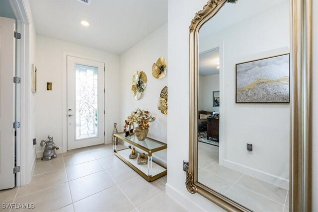 view of tiled foyer entrance