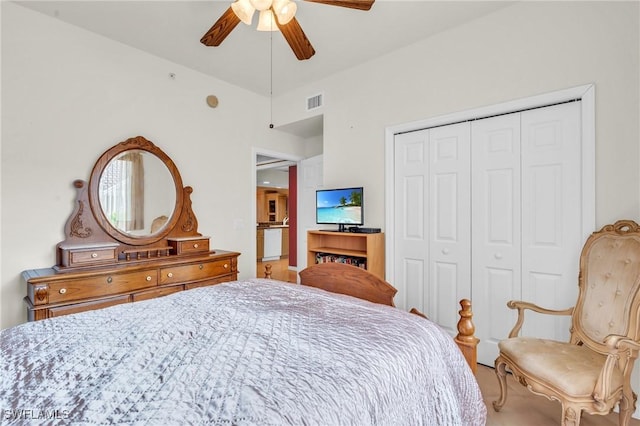 bedroom featuring ceiling fan and a closet