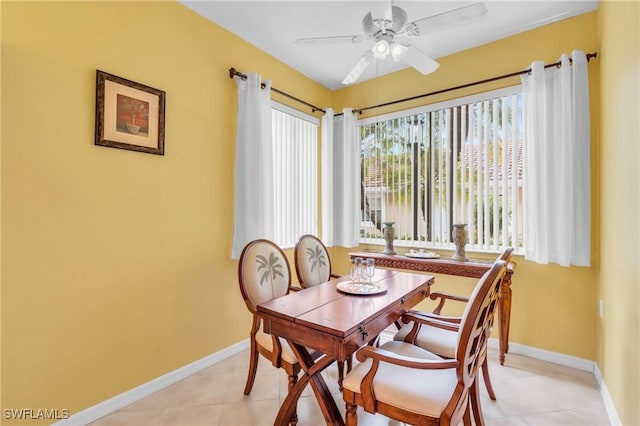 dining room featuring ceiling fan and light tile patterned floors