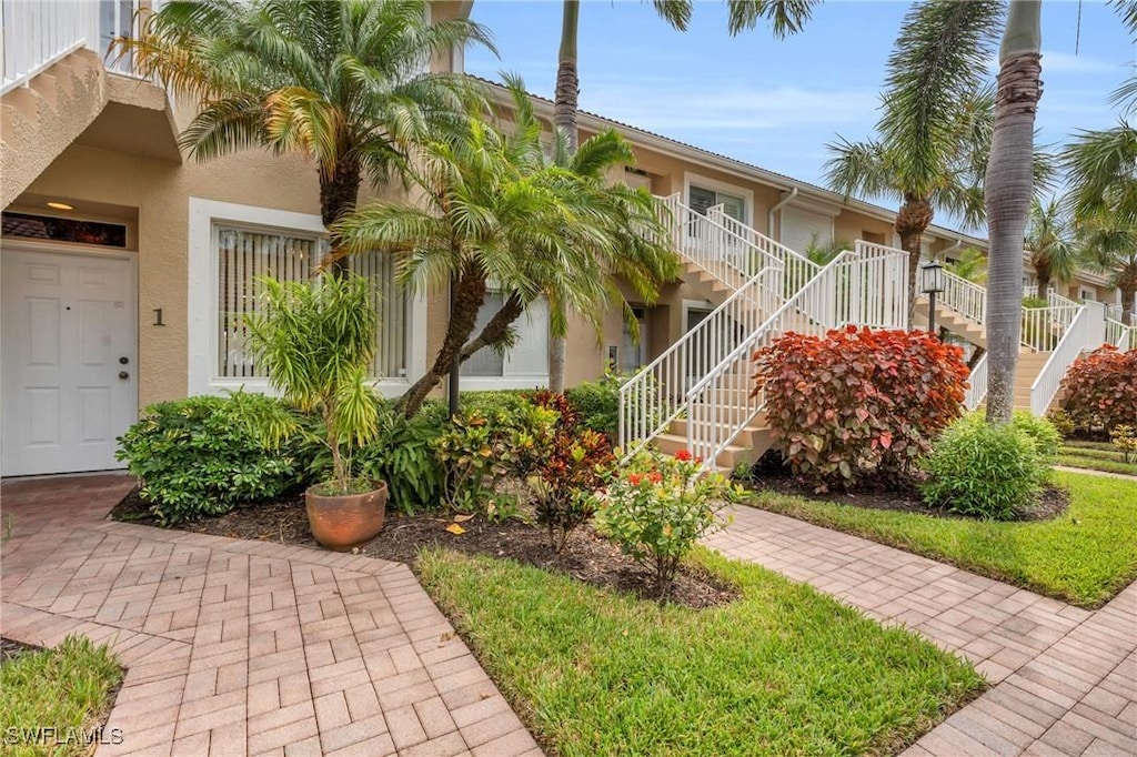 2365 Hidden Lake Ct Unit 8001, Naples, FL 34112 - view of property featuring stairway