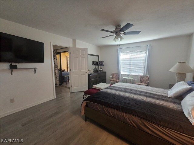 bedroom with wood-type flooring and ceiling fan