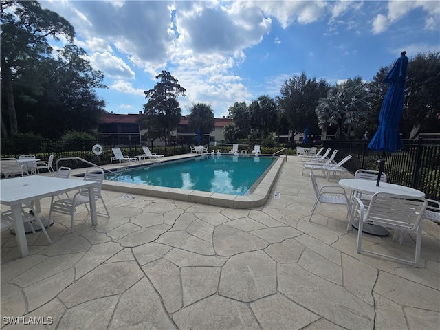 view of pool with a patio