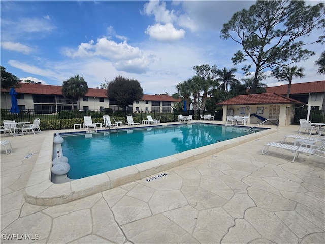 view of pool with a patio area