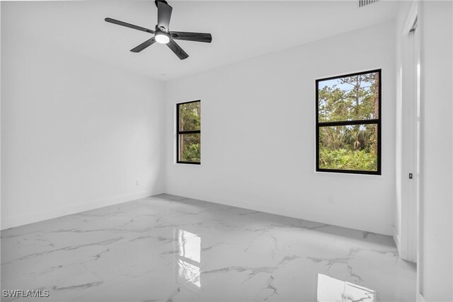 empty room featuring ceiling fan