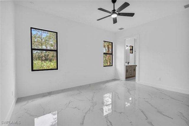 spare room featuring ceiling fan