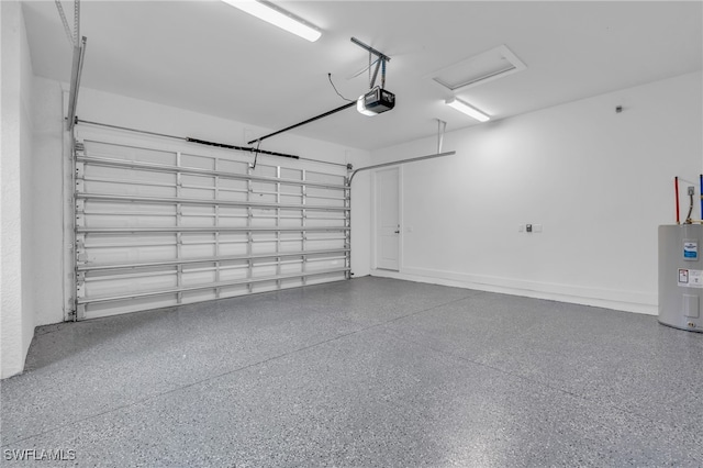 garage featuring a garage door opener and electric water heater