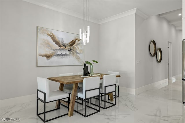 dining room featuring an inviting chandelier and crown molding