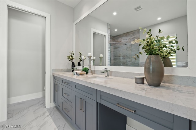 bathroom with vanity, walk in shower, and toilet