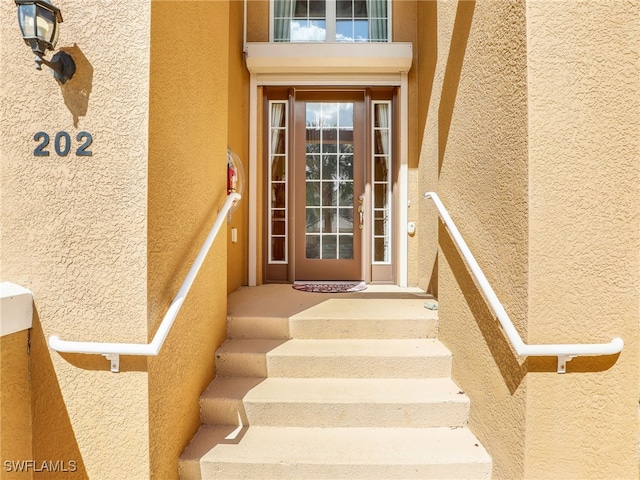 10370 Glastonbury Cir Unit 202, Fort Myers, FL 33913 - property entrance featuring stucco siding
