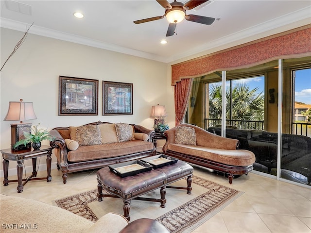 living room featuring light tile patterned flooring, ceiling fan, crown molding, and a healthy amount of sunlight