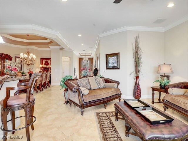 living room featuring a notable chandelier, crown molding, and light tile patterned flooring